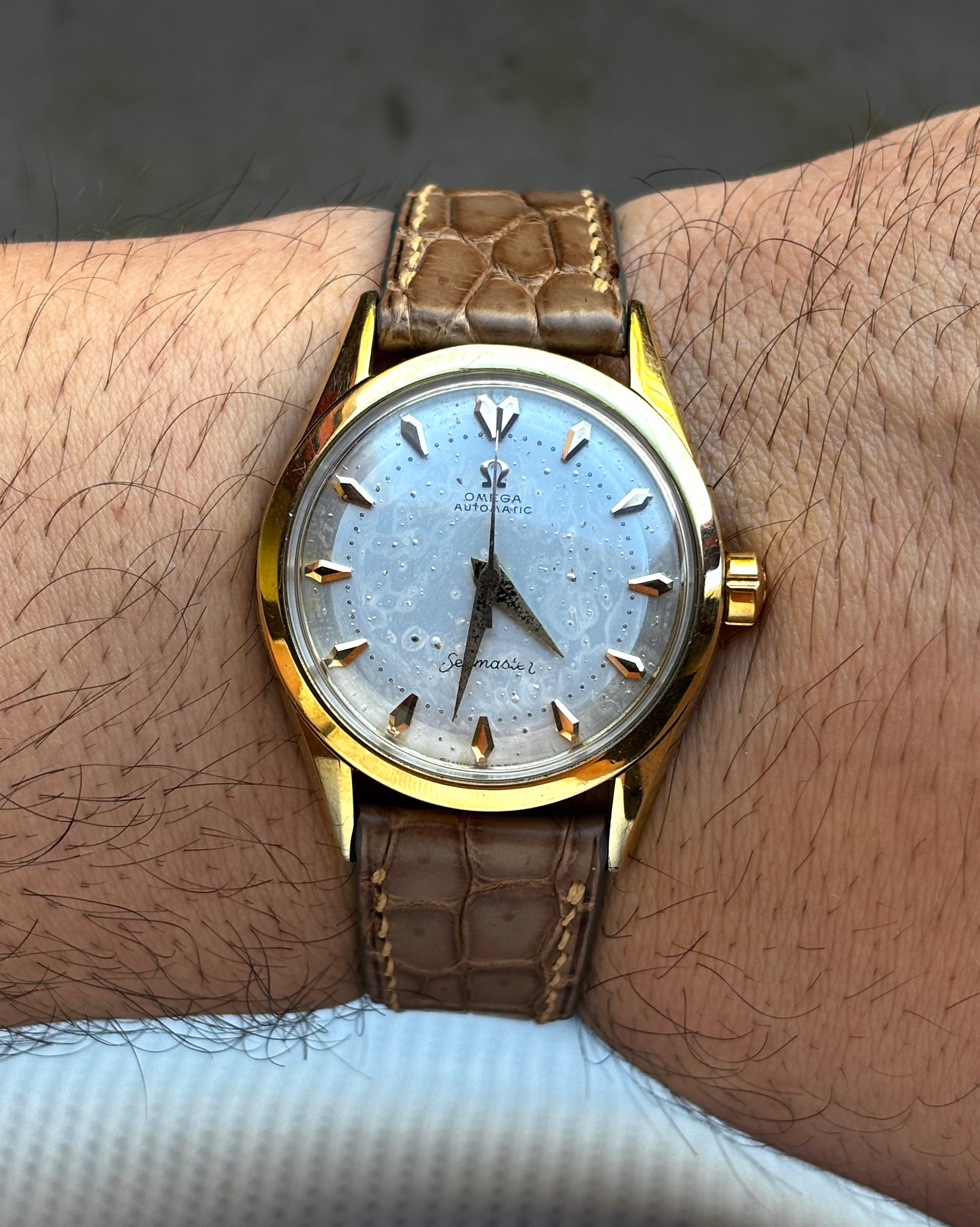 Omega Seamaster con ghiera in oro 14K