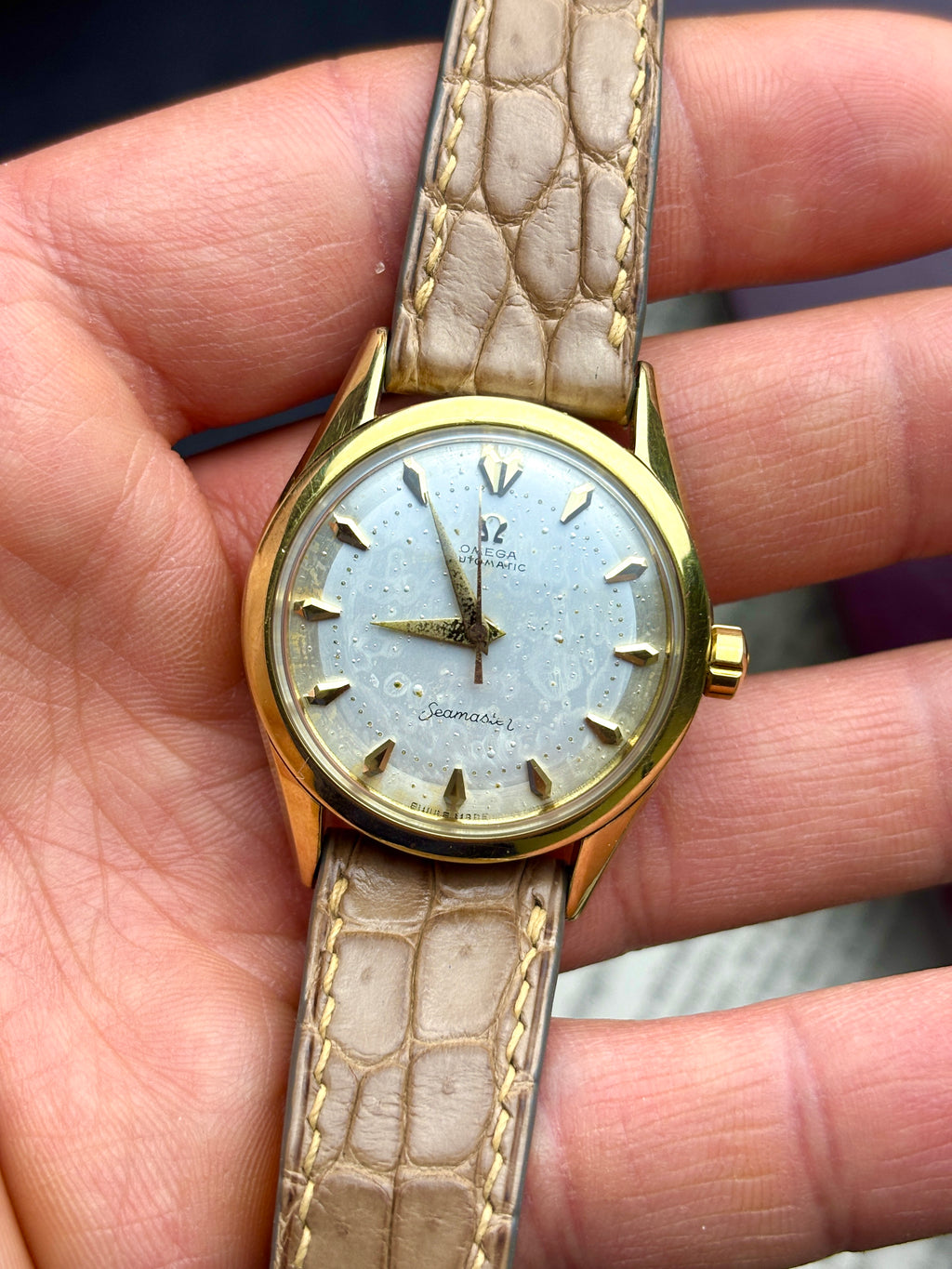 Omega Seamaster con ghiera in oro 14K